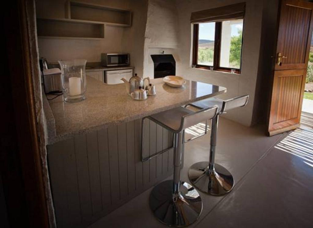 Vrisch Gewagt Boutique Self-Catering Olive Farm Pensionat Prince Albert Rum bild